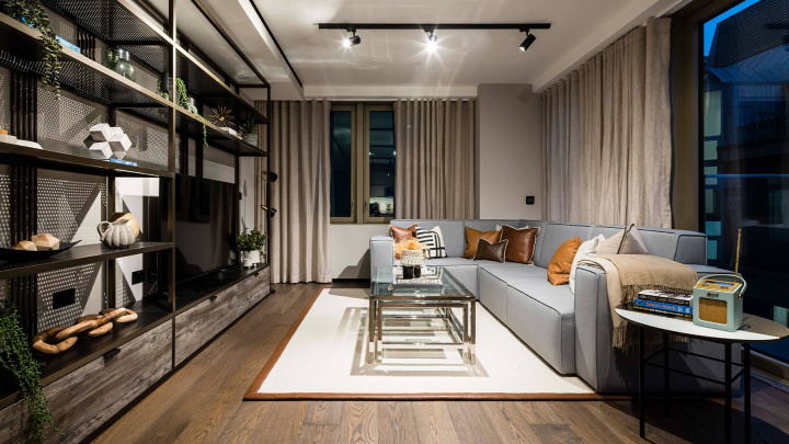 Open-plan living room of a one-bedroom apartment at The Stage, ©Galliard Homes.