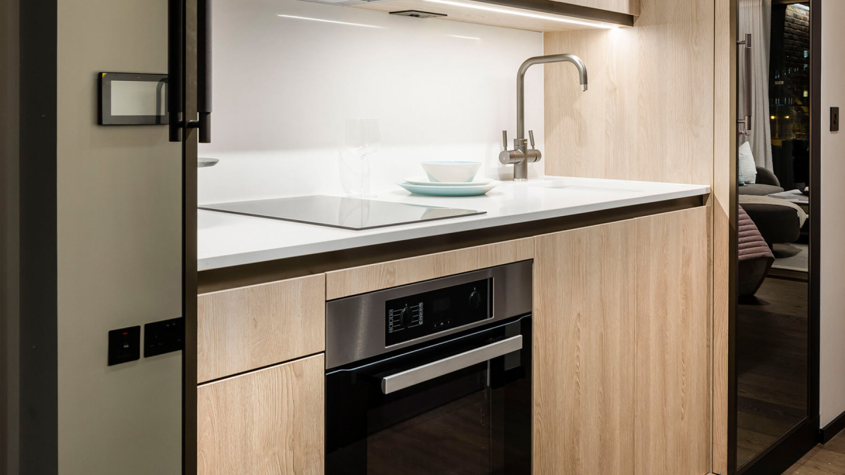 Concealed kitchen in a studio suite at The Stage, ©Galliard Homes.