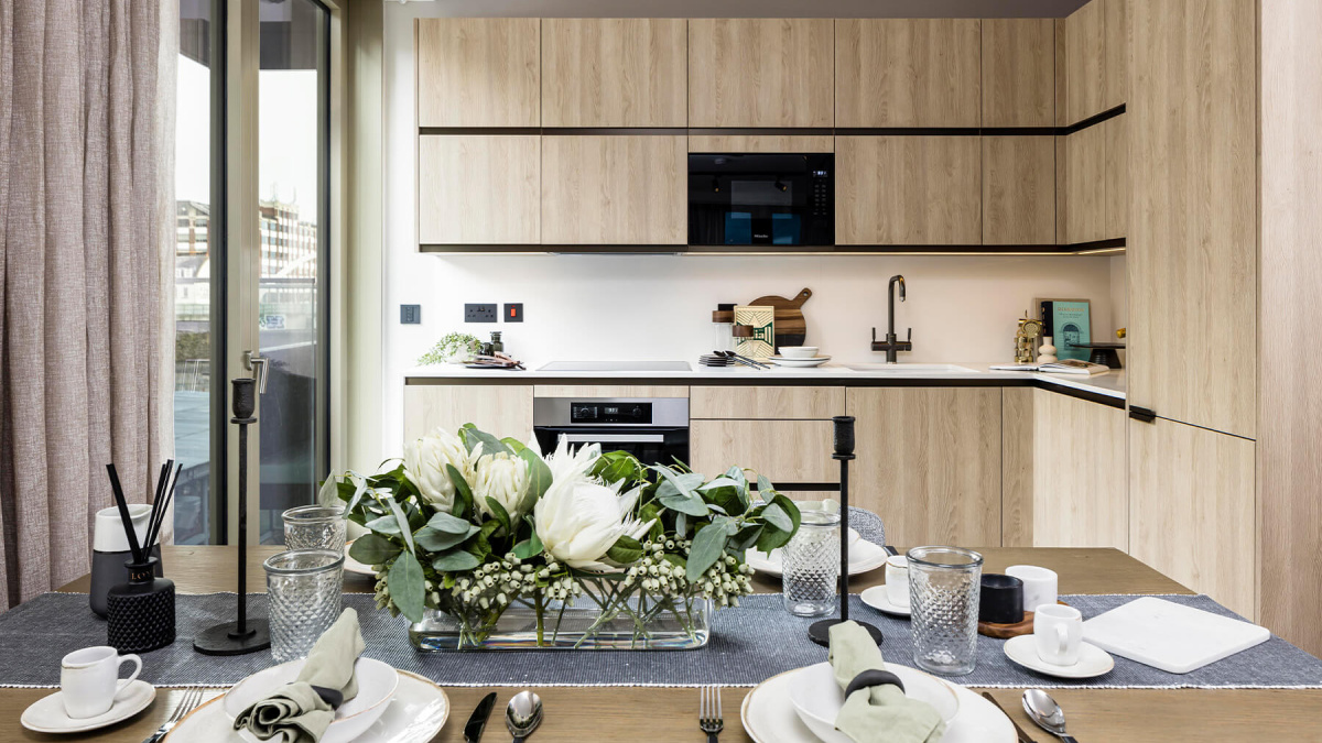 Kitchen and dining area of a one-bedroom apartment at The Stage, ©Galliard Homes.