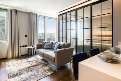 Open-plan living room of a one-bedroom apartment at The Stage, ©Galliard Homes.