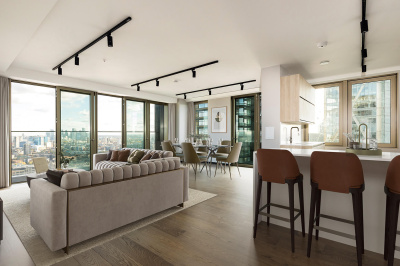 Living room of a three-bedroom apartment at The Stage, furniture superimposed for illustrative purposes only, ©Galliard Homes.